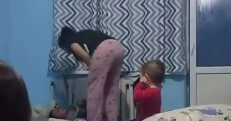 Qadın öz uşağını radiatora bağlayaraq vəhşicəsinə döydü VİDEO