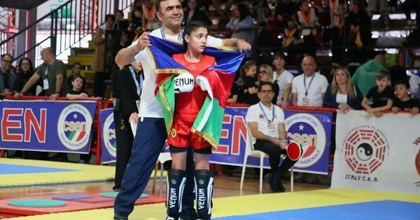 Dünya çempionu Əminə Əliyeva Bakıya qayıtdı