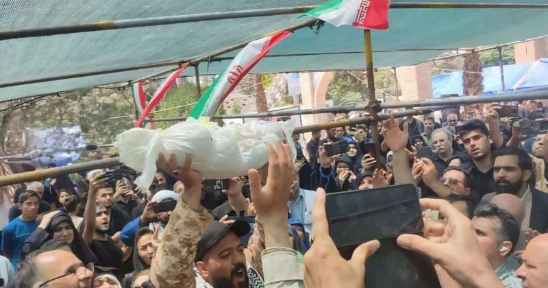 Tehranlılar İsrailin öldürdüyü 2 aylıq körpənin dəfninə AXIŞDI VİDEO