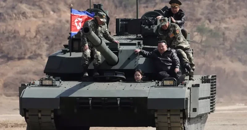 Ким Чен Ын с дочерью прокатился на танке