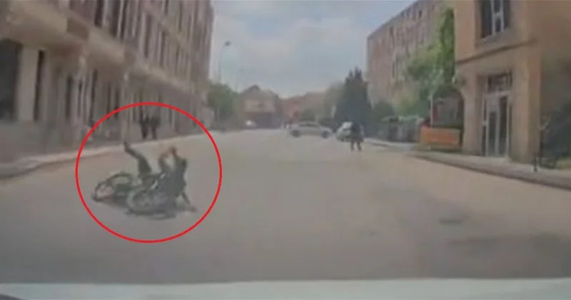 В Хырдалане ребёнок на велосипеде едва не попал под машину ВИДЕО