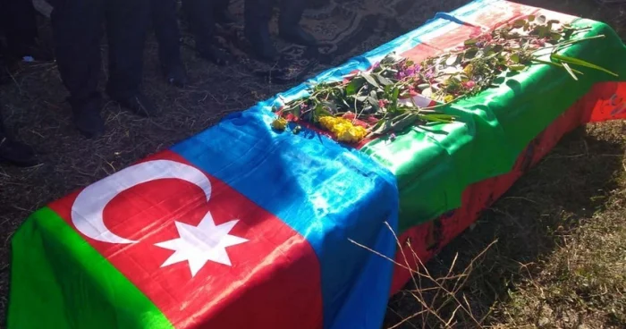 Daha bir itkin şəhidin qalıqları torpağa tapşırılıb