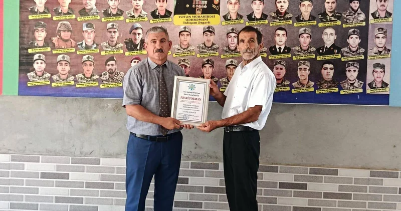 YAP Masallı rayon təşkilatı tərəfindən şəhid atası təltif edilib FOTO