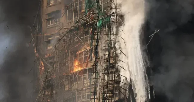 Число жертв пожара в Гонконге достигло 161 человека