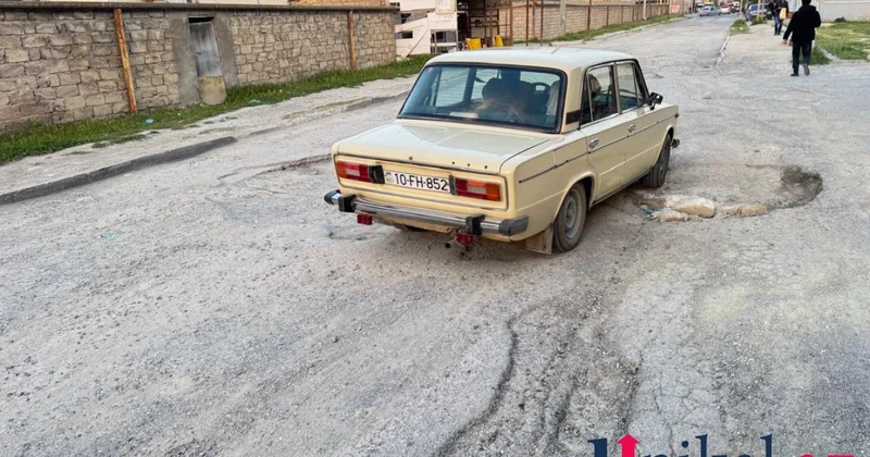 Ramanada yollar bərbad vəziyyətdə: Sürücülər çarəsiz qalıb (FOTOLAR)