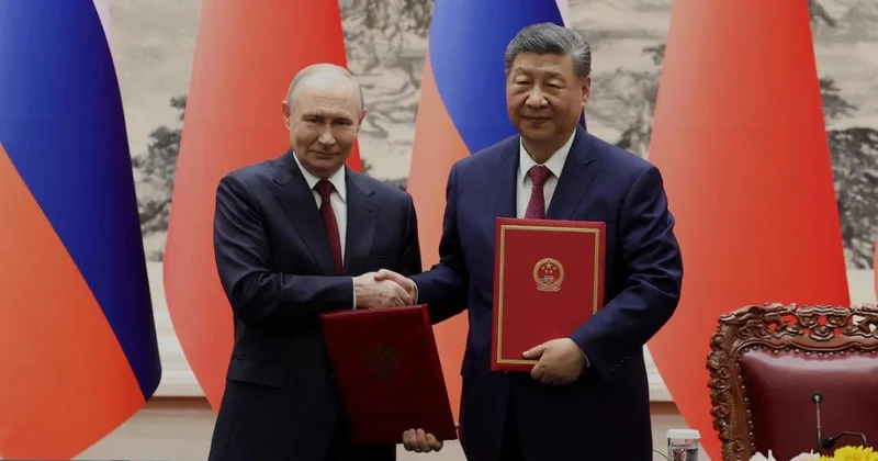 Si və Putin ABŞ ı tənqid etmək üçün bir araya gəldilər