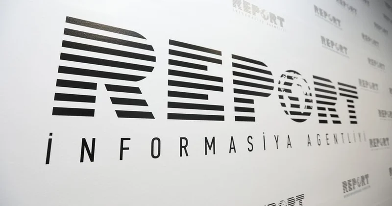 Ильхам Алиев наградил четырех сотрудников Report