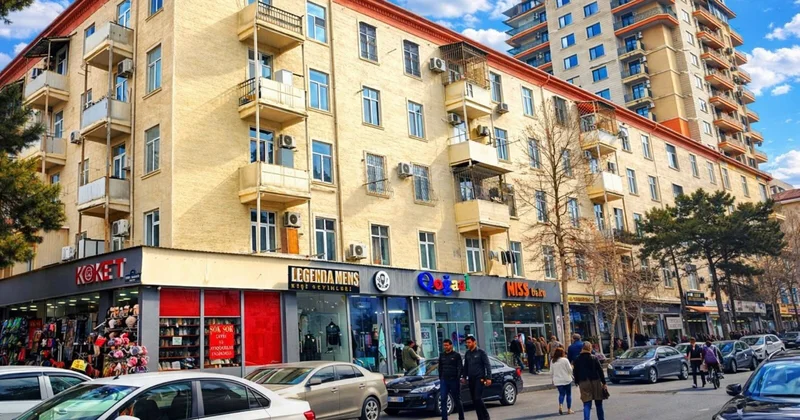 Mənzil əvəzinə obyekt: Binaların altı niyə obyektlərlə dolur?