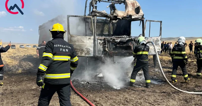 Şəkidə taxıl sahələrində yük maşınları yandı Fotolar