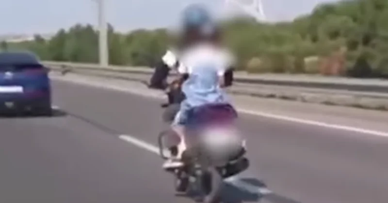 Bakıda övladını təhlükəli şəkildə daşıyan motosiklet sürücüsü saxlanılıb