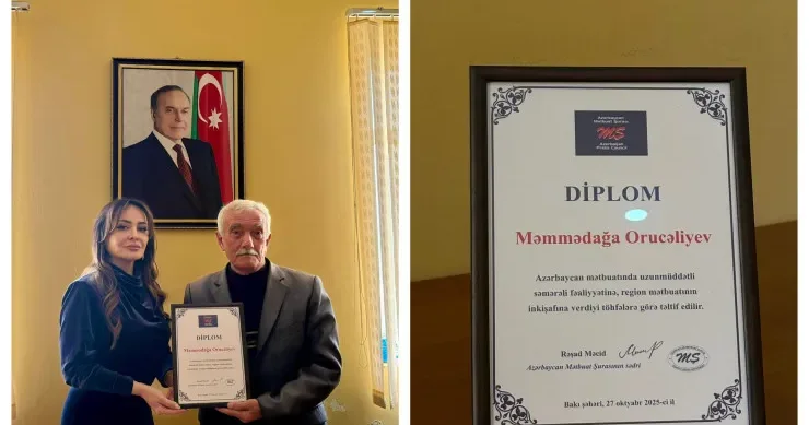 Deputat baş redaktora diplom təqdim etdi