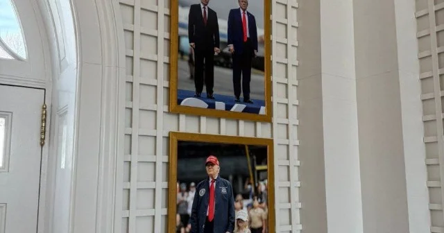 Putinlə çəkilmiş şəklini divardan asdı