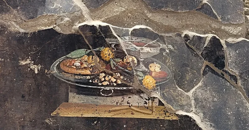 Pompeydəki qədim freskada pizzanın əcdadı tapıldı