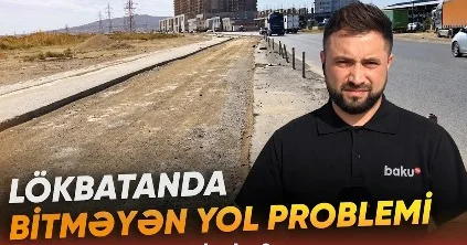 Qəsəbənin girişində yoxa çıxan yol