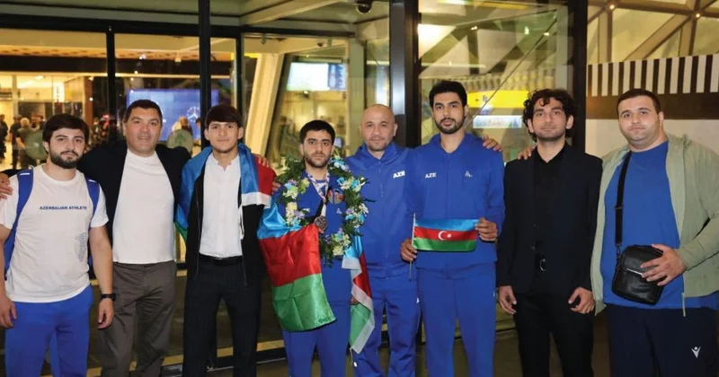 Bürünc medal qazanan atıcılarımız Vətənə qayıdıblar FOTO