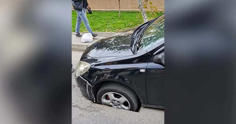 Maşın “lyuk”a düşdü, sürücü kömək çağırdı Video