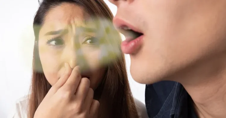 Ağız qoxusu nə ilə bağlıdır?