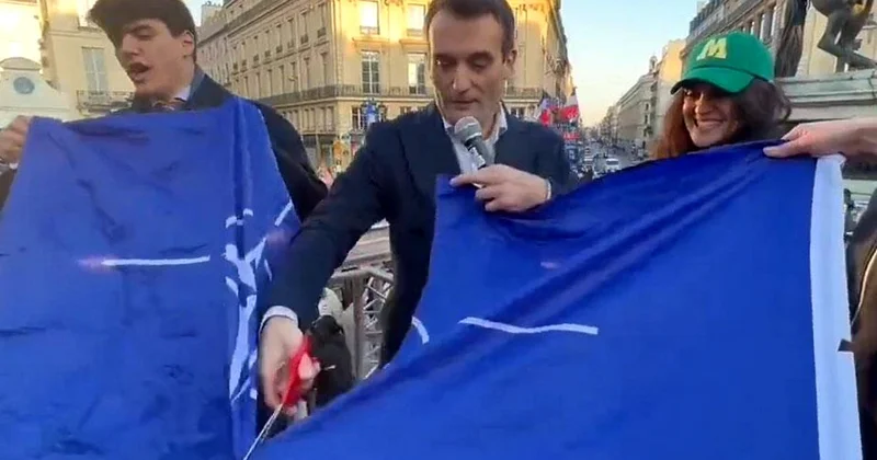 Протестующие в Париже разорвали флаг НАТО ВИДЕО