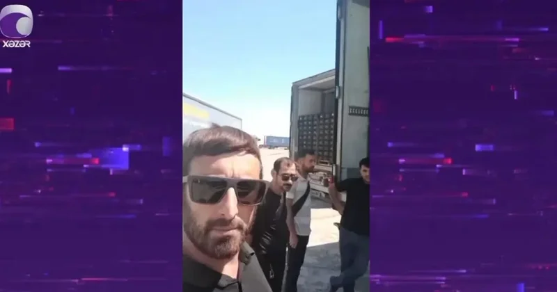 Azərbaycanlı tır sürücüləri İran sərhədini tərk edə bilmirlər 100 min manatlıq məhsul xarab oldu VİDEO