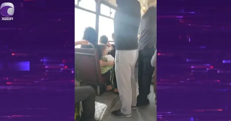 Bakıda sürücü avtobusu qapısı açıq sürdü? VİDEO