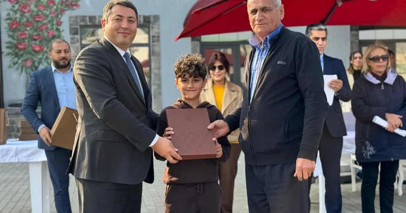 Bir gündə üç ünvan!