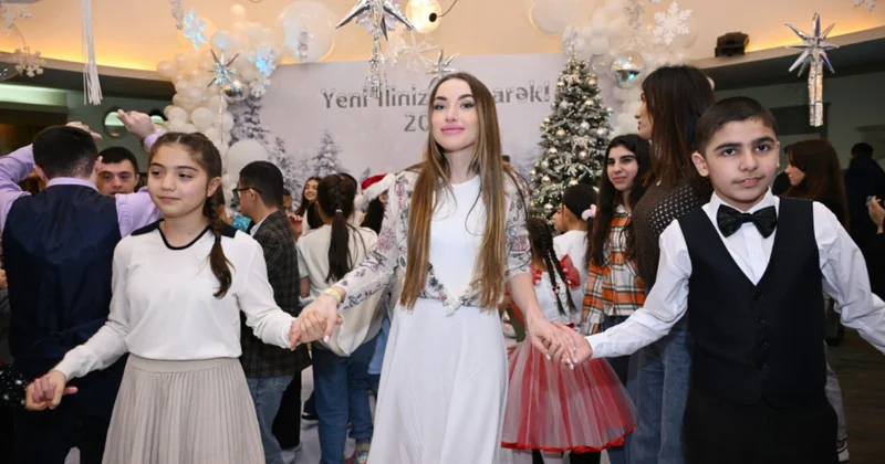 Лейла, Арзу и Алена Алиевы на праздничном торжестве для детей, нуждающихся в особой заботе Minval Politika