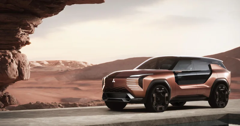 Mitsubishi рассекретила кроссовер с двухспальной кроватью в прицепе