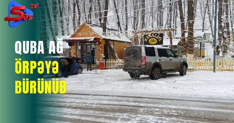 Quba ağ örpəyə bürünüb