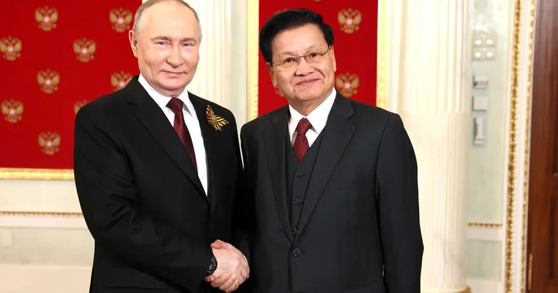 Putin laouslu həmkarı ilə görüşdü