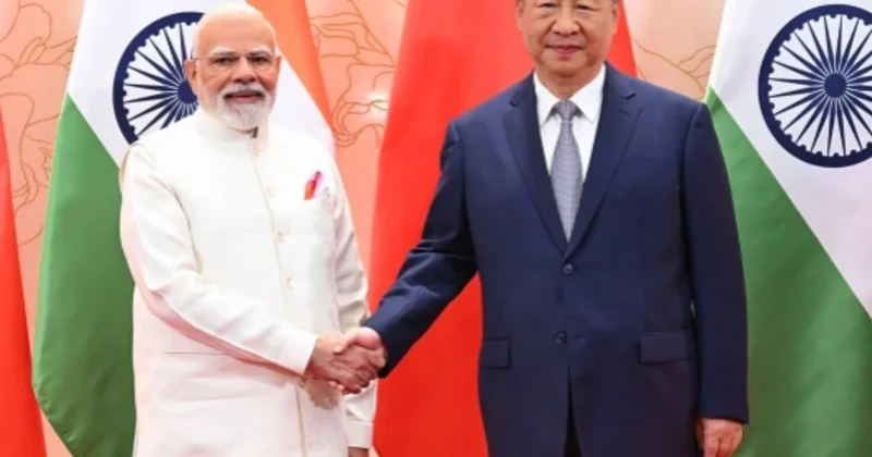 Si Cinpin və Narendra Modi ABŞ yə qarşı birləşmək vədini verdilər