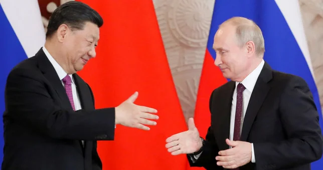 Si Cinpin Putinlə birlikdə yeni nailiyyətlərə imza atmağa hazır olduğunu bildirib